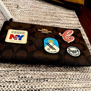 Brand new coach sky wristlet never been used